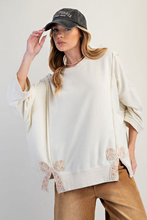EASEL Women's Sweaters Bow Patch Bottom Hem Washed Terry Pullover || David's Clothing