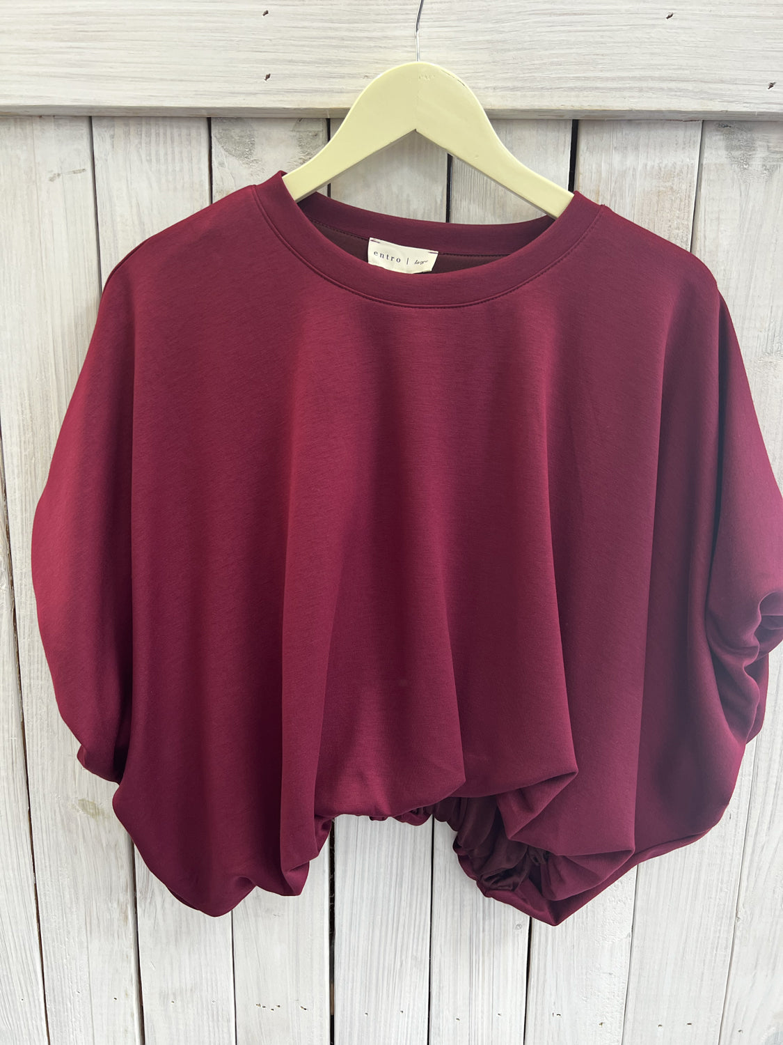 ENTRO INC Women's Top Solid Jersey Waist-Length Bubble Hem Top